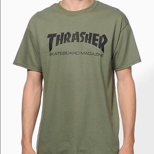 An olive green thrasher shirt.